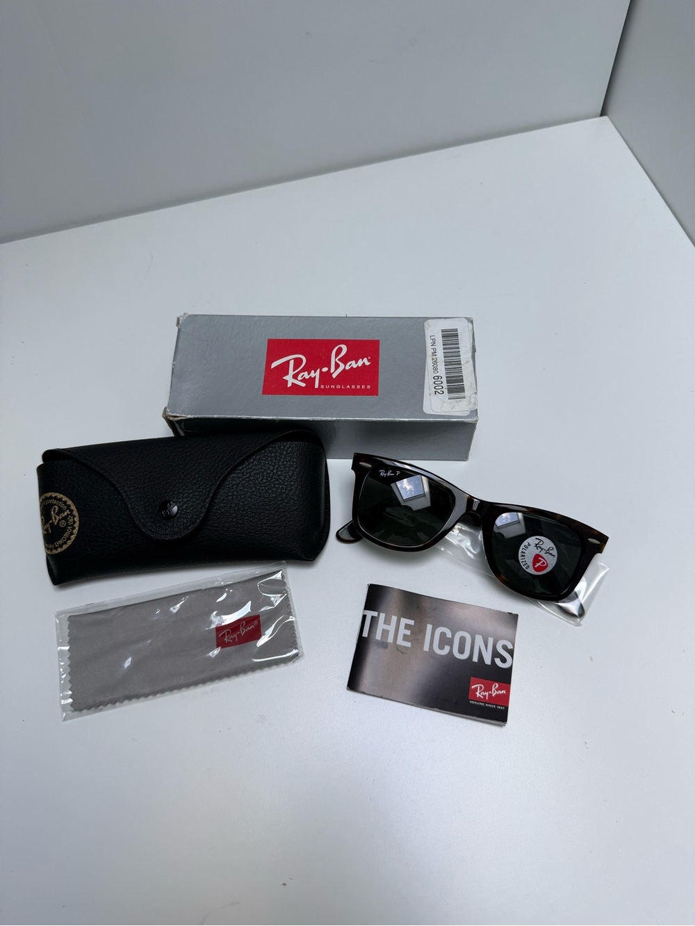 Ray-Ban Men’s Tortoiseshell Wayfarer Sunglasses with Polarized Black Lenses